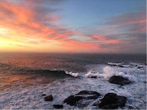 Sunset and waves at Fort Ross. Photo by Ed Storck.