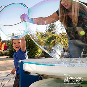 Making giant bubbles at the Children's Museum of Sonoma County